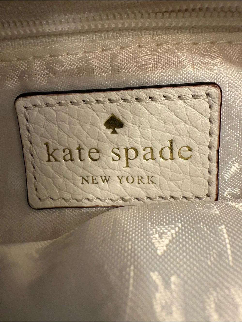 kate spade White Pebbled Leather Drawstring Backpack